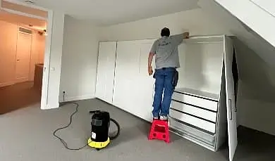 cleaning top of wardrobe